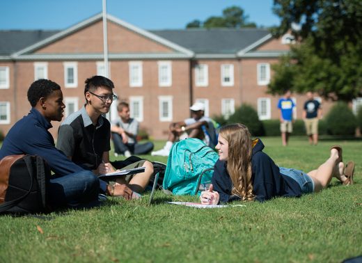 NC Wesleyan students study on lawn