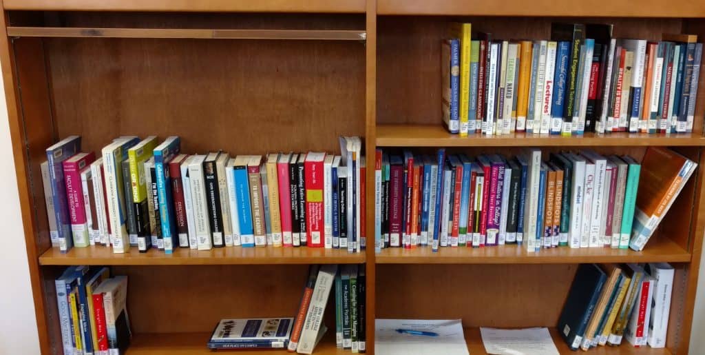 Brown TLC Bookshelf with books