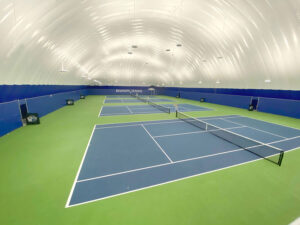 IndoorSports-Education-Facility-Interior-Tennis-Courts-Wide-View2-web