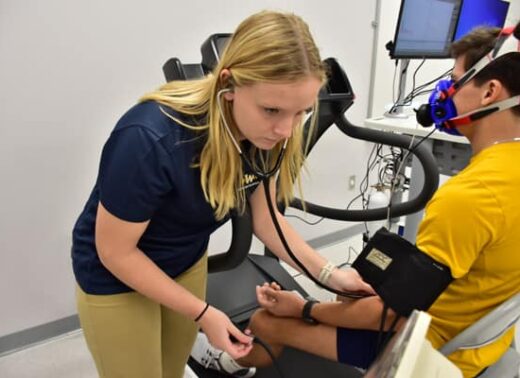 exercise science student testing athlete