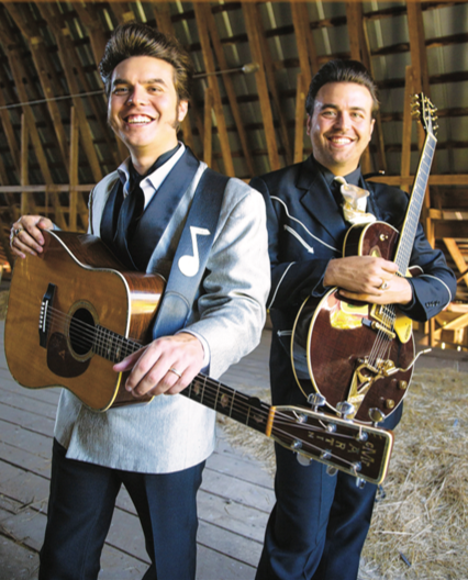 malpass brothers inside barn with guitars