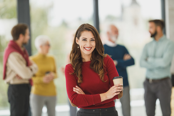 white female wearing red sweater