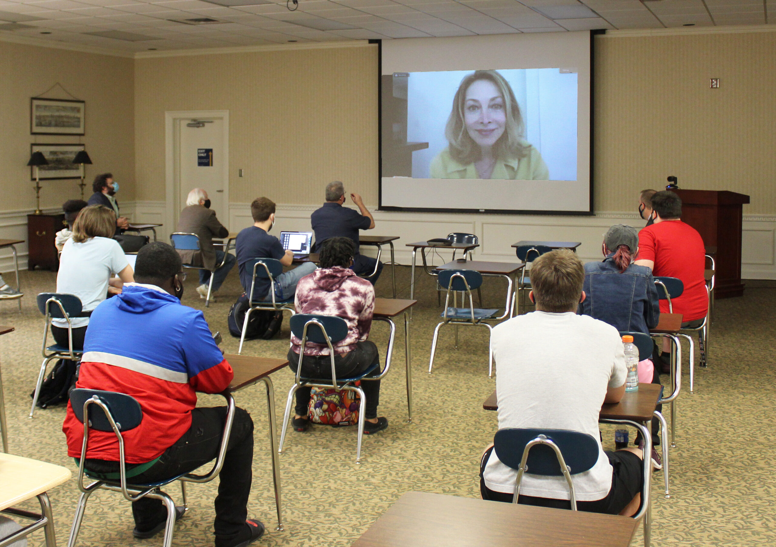 marketing class room with student viewing video
