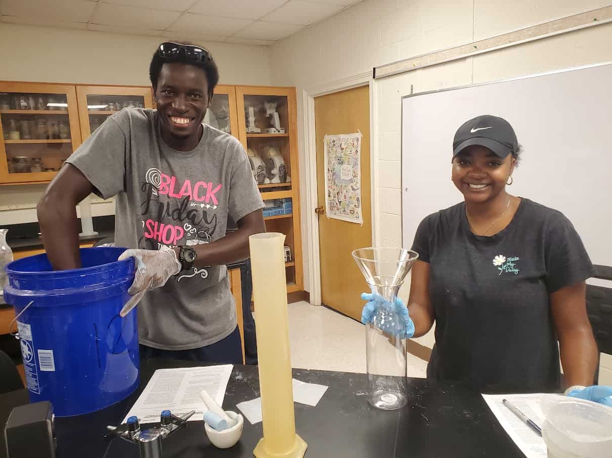 black male and female in science lab
