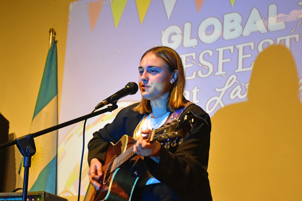 international female playing guitar