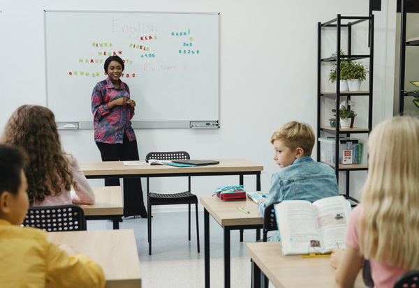 teacher-teaching-k-12-kids-in-classroom