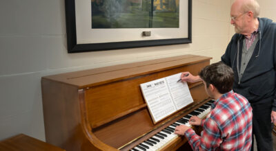 student learning piano