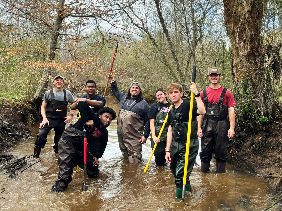 environmental science students hands on learning