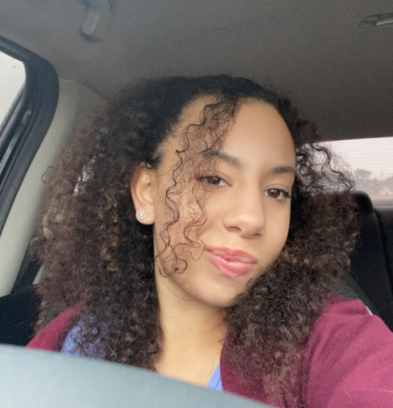 female with beautiful hair in car